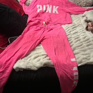 Pink suit the top is x large bottom is extra small